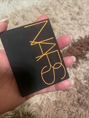 NARS Matte Black Compact with Orange Logo